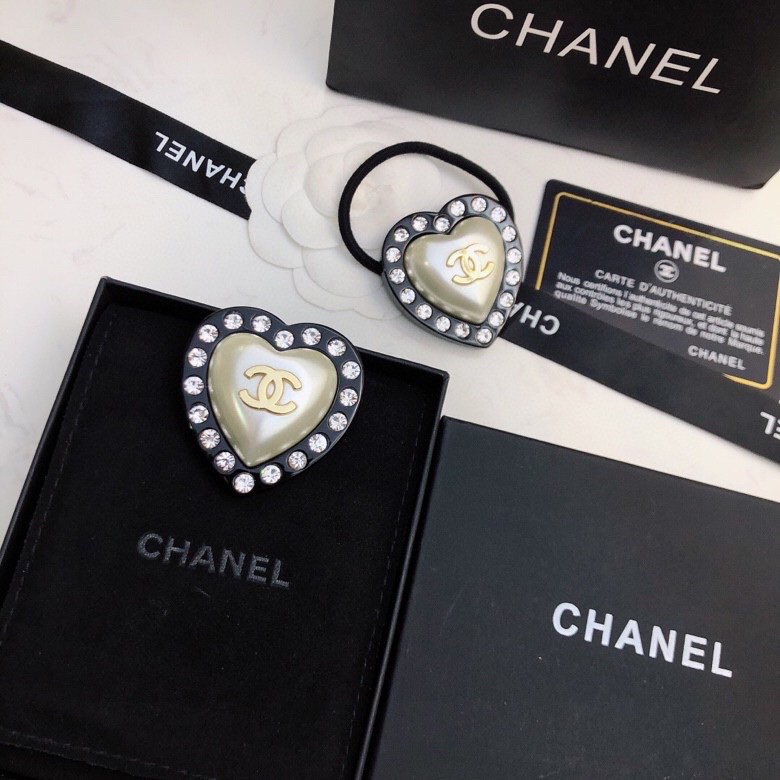 Ch*el brooches